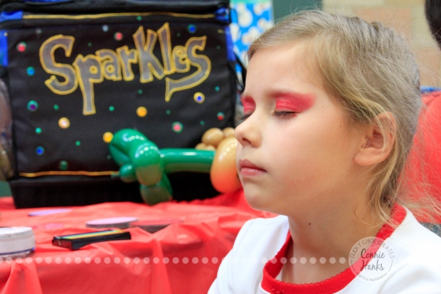 Connie Hanks Photography // ClickyChickCreates.com // JOY in the face of a 7-year old getting her face painted!