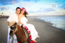 Connie Hanks Photography // ClickyChickCreates.com // engagement couple session, Rosarito, Mexico beach, pony, flower head wreath